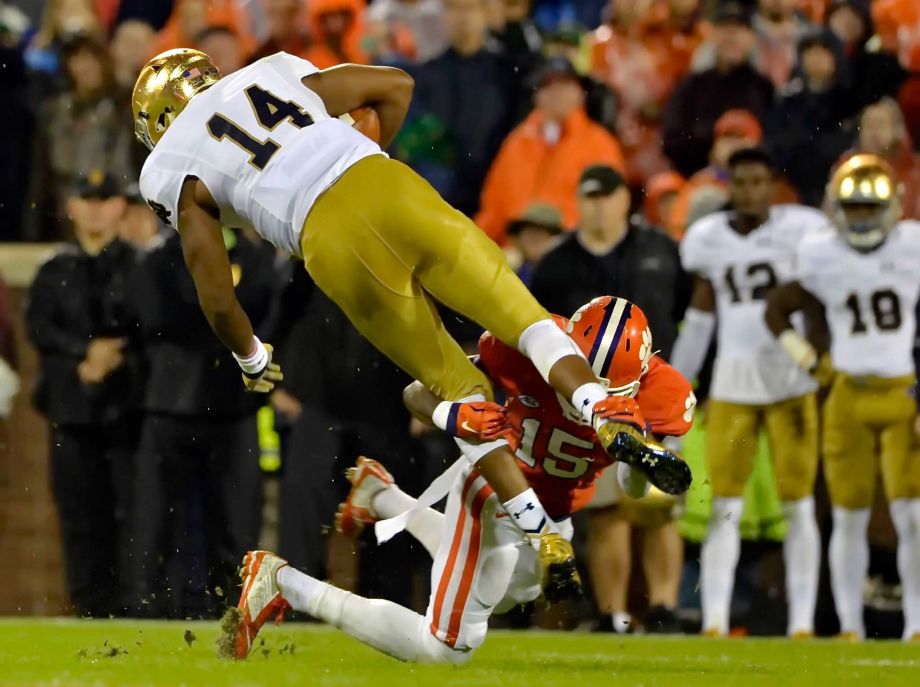 Notre Dame quarterback De Shone Kizer is tackled by Clemson's T.J. Green during the first half of an NCAA college football game Saturday Oct. 3 2015 in Clemson S.C