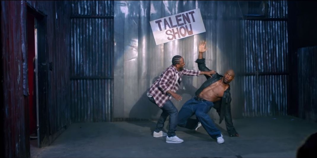 Kendrick Lamar and Terry Crews in the video for'These Walls