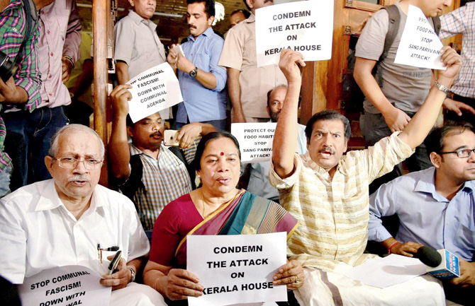 Kerala MPs stage a protest outside Kerala House over the beef controversy in New Delhi on Tuesday. Pic  PTI