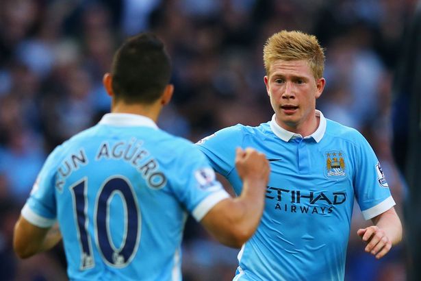 Kevin de Bruyne of Manchester City celebrates scoring his team's first goal with his team mate Sergio Aguero