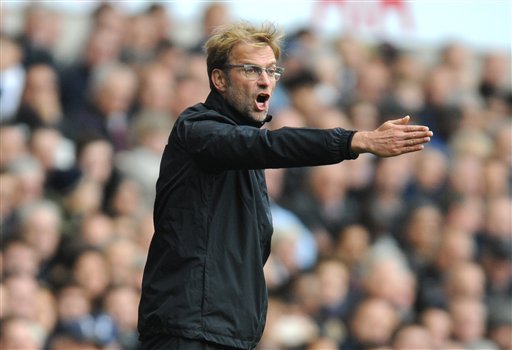 Liverpool manager Juergen Klopp gestures during the English Premier League soccer match between Tottenham Hotspur and Liverpool at the White Hart Lane London England Saturday Oct. 17 2015