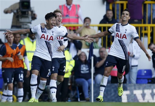 Tottenham Hotspur's Heung Min Son left celebrates with Christian Eriksen and Erik Lamela right after scoring his side's first goal of the game against Crystal Palace during their English Premier League match at White Hart Lane London Sund