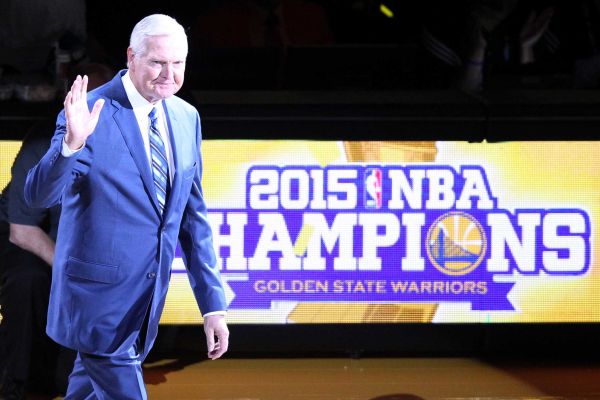 Executive Board Member Jerry West waves to the