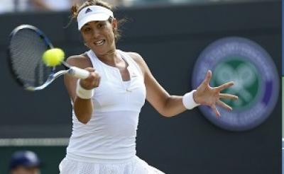 Garbine Muguruza won her second straight match at the WTA Finals on Wednesday defeating Angelique Kerber in straight sets