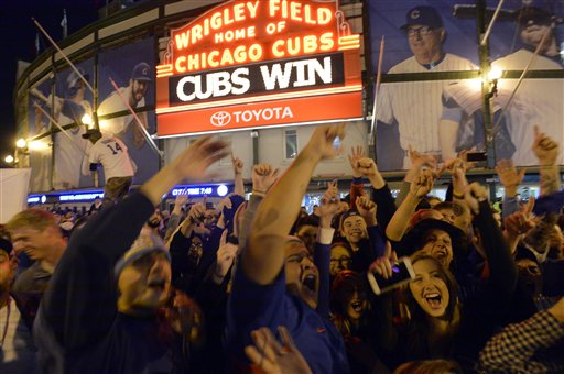 Fans gather on the streets outside of Wrigley Field after the Cubs won 6-4 in Game 4 in baseball's National League Division Series against the St. Louis Cardinals Tuesday Oct. 13 2015 in Chicago