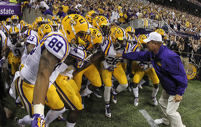 LSU coach Les Miles leads the team onto the field before its game Saturday vs. Wisconsin.  Troy Taormina USA TODAY Sports