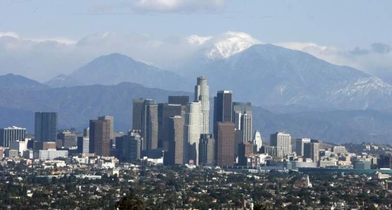 Downtown Los Angeles is shown in front of snow-capped mountains on a rare smog-free day on Dec. 18 2006