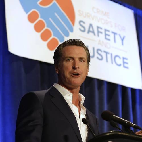 Lt. Gov. Gavin Newsom speaks at the Californians for Safety and Justice conference in Sacramento Calif. Newsom and a gun control advocacy group are proposing a 2016 ballot initiative to strengthen the