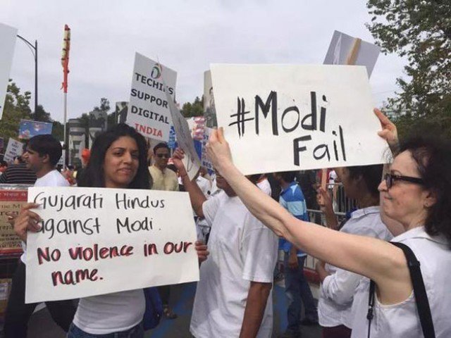 Protesters hold a protest against Indian Prime Minister Narendra Modi who recently visited Silicon Valley and met Facebook CEO Mark Zuckerberg