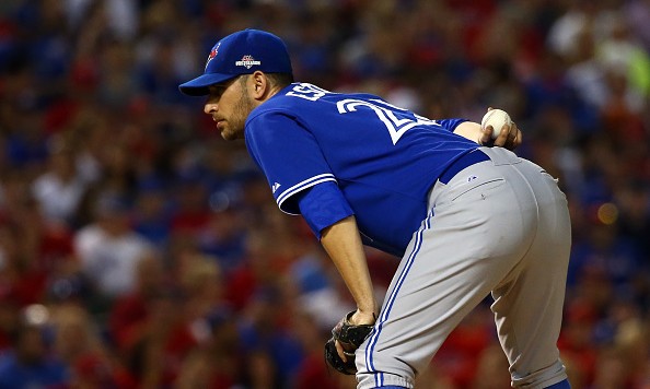 ARLINGTON TX- OCTOBER 11 Marco Estrada #25 of the Toronto Blue Jays looks on in the sixth inning against the Texas Rangers during game three of the American League Division Series