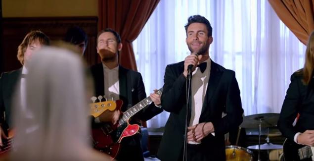 Adam Levine and Maroon 5 crash several weddings in the music video for “Sugar.”