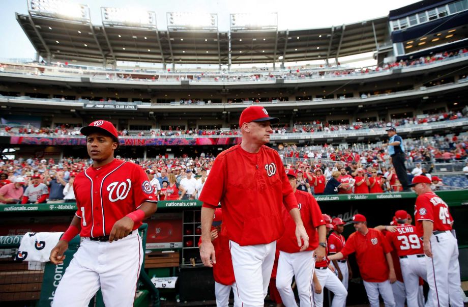 Washington Nationals manager Matt Williams center walks out of the dugout after a baseball game against the Cincinnati Reds at Nationals Park Monday Sept. 28 2015 in Washington. The Nationals won 5-1