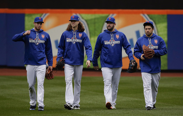 From left New York Mets pitchers Steven Matz Jacob de Grom and Matt Harvey and catcher Travis d'Arnaud walk off the field at the end of batting practice Sa