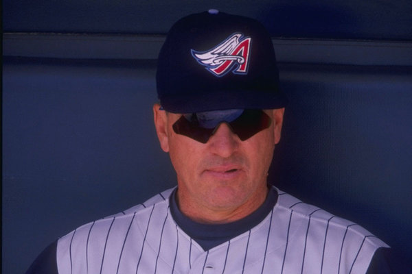 Joe Maddon of the Anaheim Angels in the dug out during an interleague game in 1998