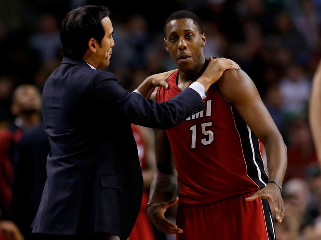 Miami Heat point guard Mario Chalmers with head coach Eric Spoelstra