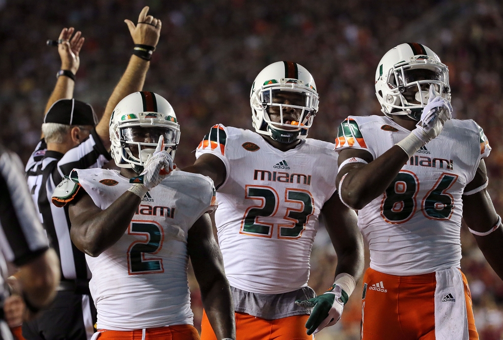 Joseph Yearby #2 of the Miami Hurricanes celebrates a touchdown during a game against the Florida State Seminoles at Doak Campbell Stadium