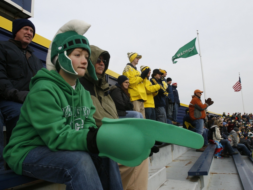 Michigan State fan Collin Turkelsomn 11 of Charlevoix MI watches the game at Big Chill game at Michigan Stadium