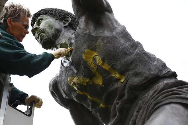 Michigan Fans Take Spray Paint to Michigan State's Magic Johnson Statue