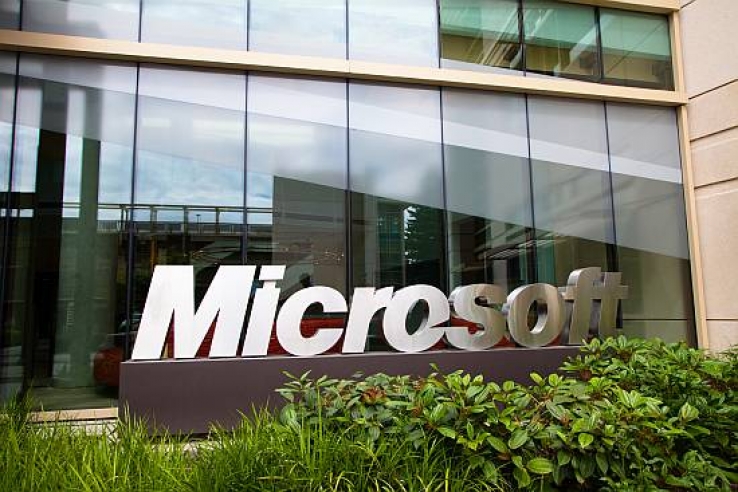 Microsoft lifts profits while revenue slips