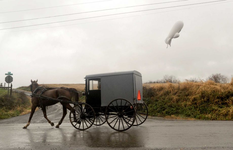 An unmanned Army surveillance blimp that broke loose Wednesday from its ground tether in Maryland floats at about 1,000 feet just south of Millville Pa.﻿ It came down by itself later