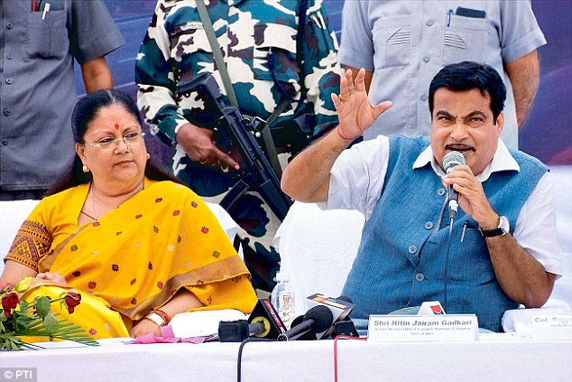 Minister of road transport highways and shipping Nitin Gadkari addresses the media with Rajasthan chief minister Vasundhara Raje in Jaipur