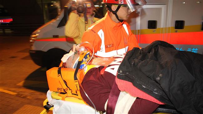 An injured person is taken away by emergency personnel after a high-speed boat accident Hong Kong