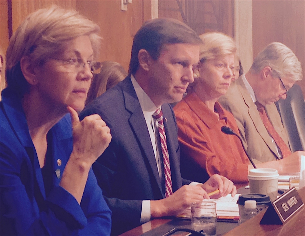 Connecticut U.S. Sen. Chris Murphy second from left with Democratic Sens. Elizabeth Warren of Massachusetts Tammy Baldwin of Wisconsin and Sheldon Whitehouse of Rhode