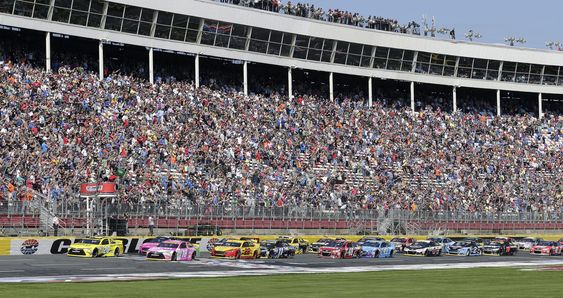 Kyle Busch lead the field at the start of the NASCAR Sprint Cup series auto race at Charlotte Motor Speedway in Concord N.C. Sunday Oct. 11 2015