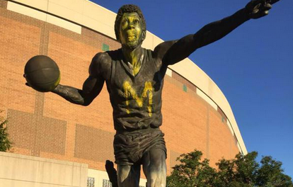 Michigan fans vandalize Michigan State's Magic Johnson statue