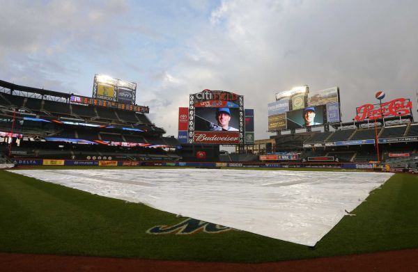 The tarp covers the field as the start