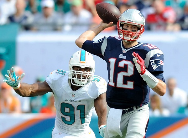 New England Patriots quarterback Tom Brady calls a play against the New York Jets during the second half of their NFL football game in East Rutherford New Jersey