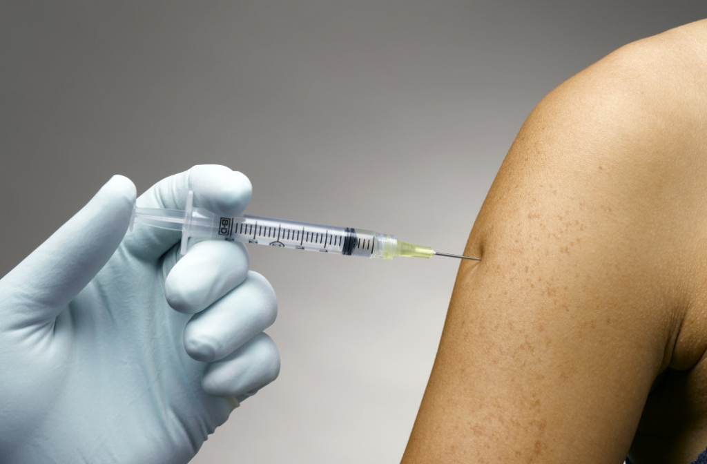 Person receiving a vaccine