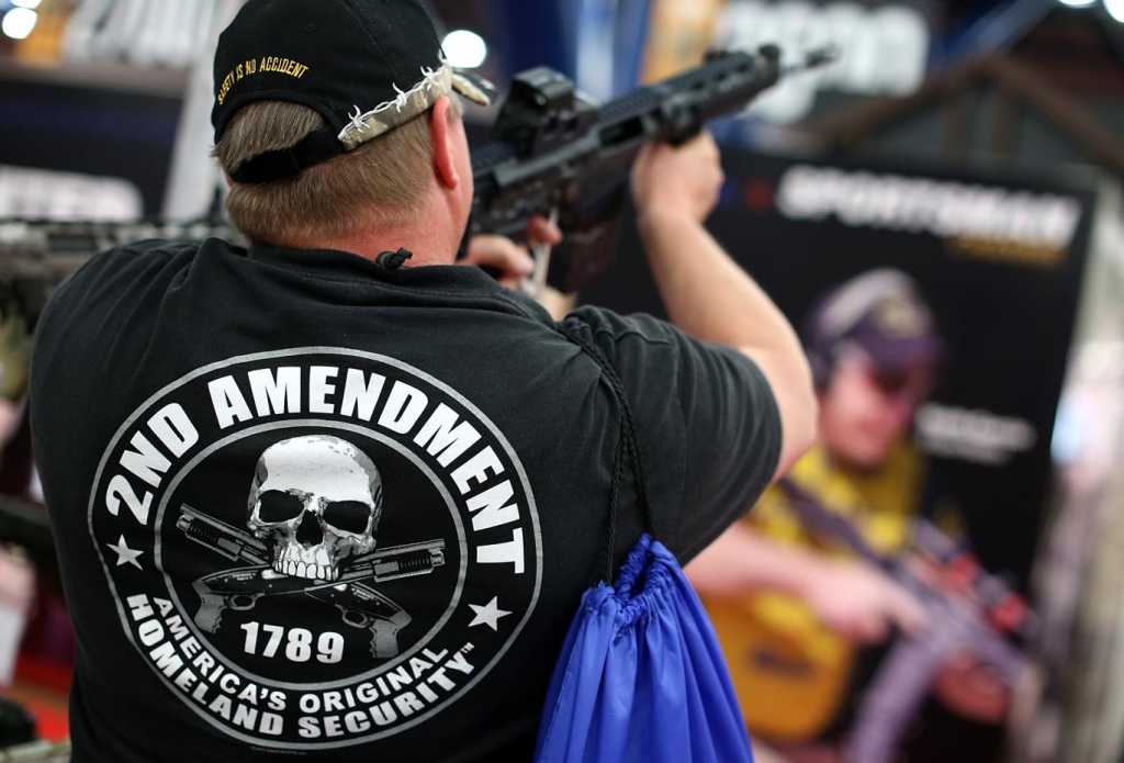 The second amendment to the US Constitution gives all Americans the right to own guns