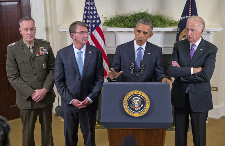 President Barack Obama accompanied by from left Joint Chiefs Chairman Gen. Joseph Dunford Defense Secretary Ash Carter and Vice President Joe Biden speaks about Afghanistan Thursday Oct. 15 2015 in the Roosevelt Room of the White House in Washing