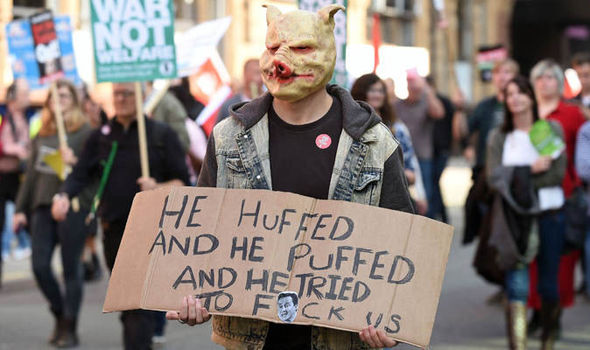 A protestor holds a sign at the march