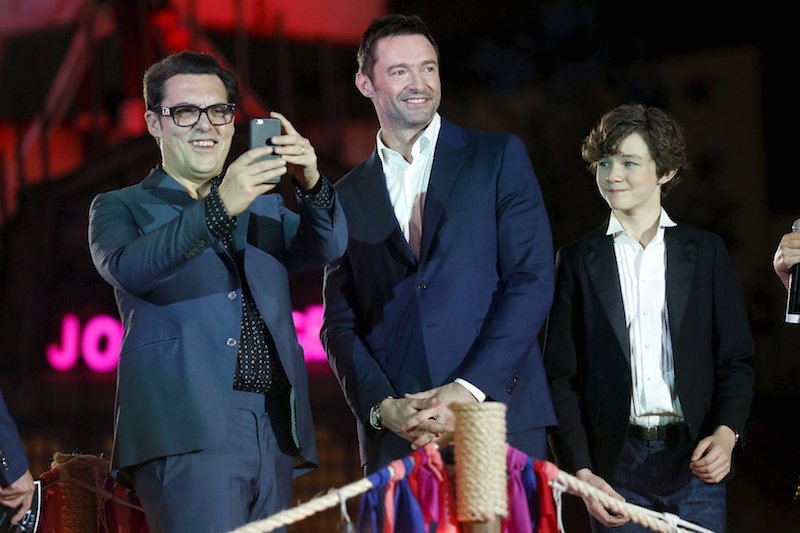 Actors Hugh Jackman and Levi Miller with director Joe Wright during the blue carpet premiere of'Pan in Mexico City