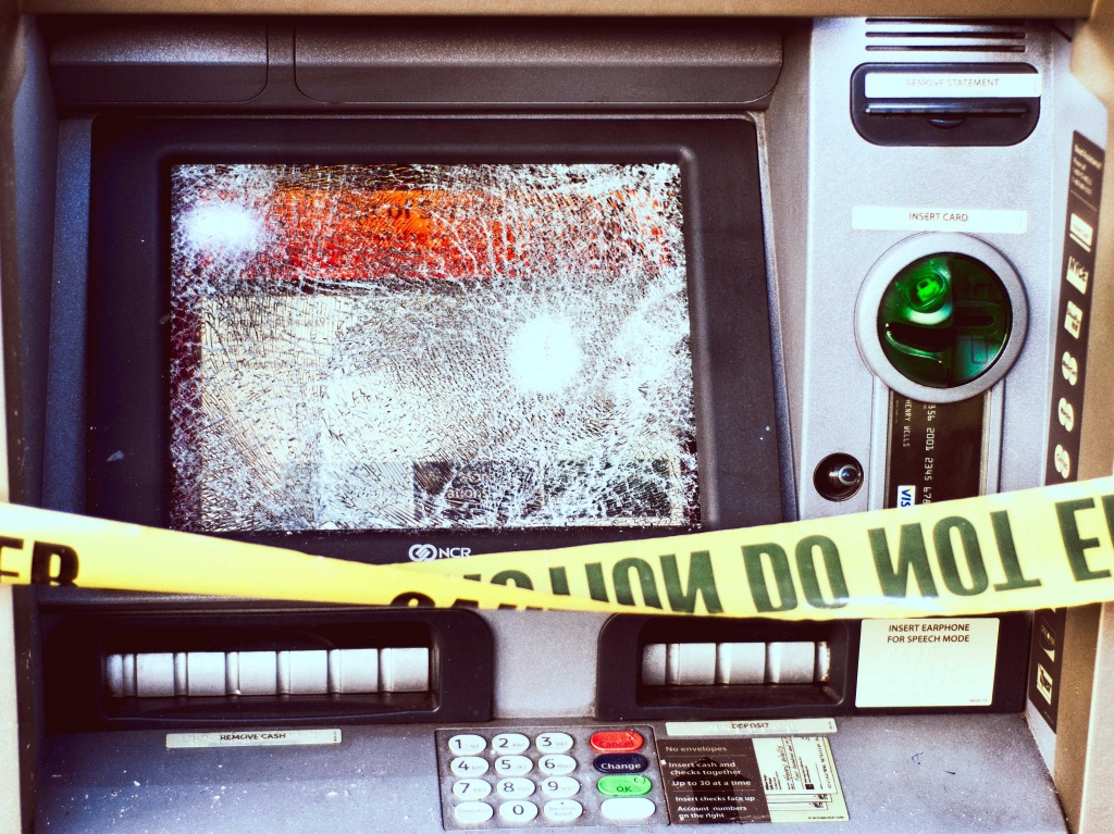 Smashed cash machine broken atm