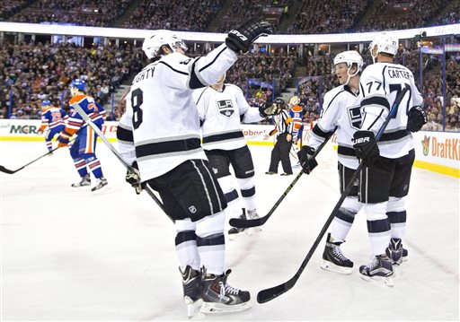 Los Angeles Kings celebrate a goal against the Edmonton Oilers during first period NHL action in Edmonton Alberta Sunday Oct. 25 2015