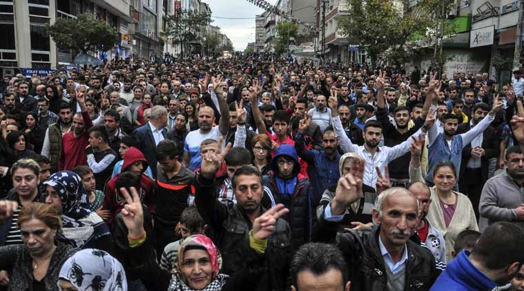 People march in protest of an explosion that killed scores of people in Ankara in Istanbul Turkey Saturday Oct. 10 2015