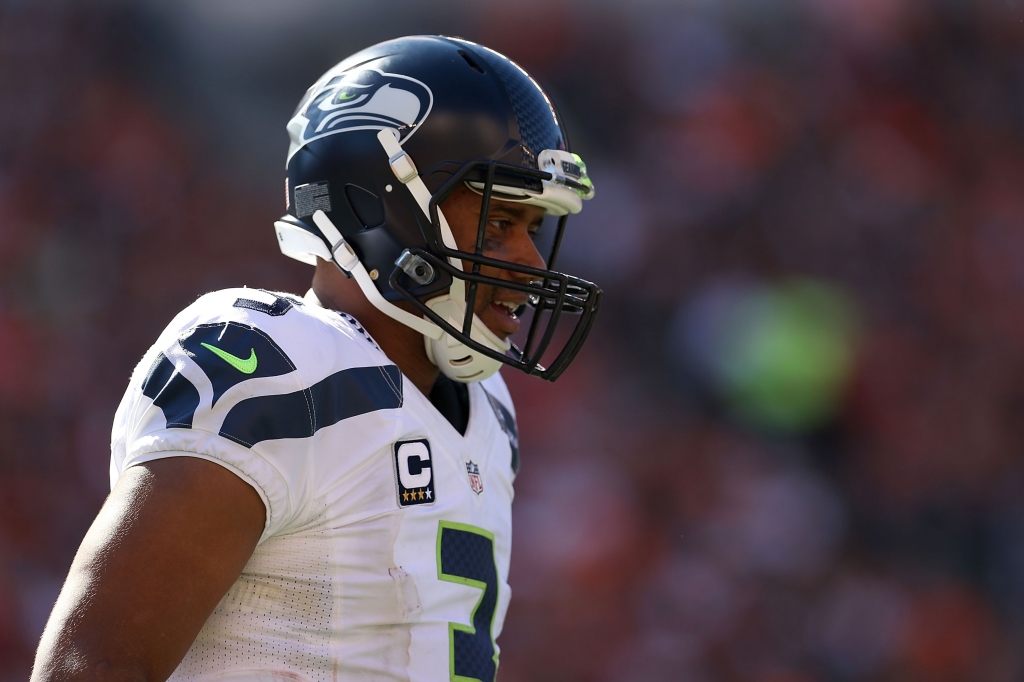 CINCINNATI OH- OCTOBER 11 Russell Wilson #3 of the Seattle Seahawks walks off of the field during the third quarter of the game against the Cincinnati Bengals at Paul Brown Stadium