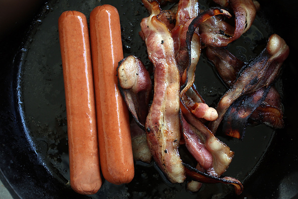 Processed meats including hot dogs and bacon raise the risk of developing certain cancers according to the World Health Organization