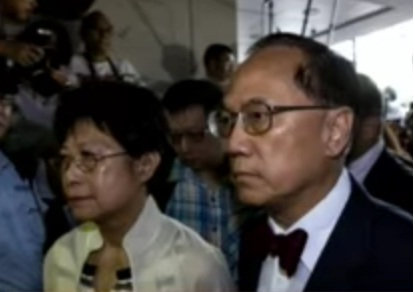 Donald Tsang appears at court together with his wife