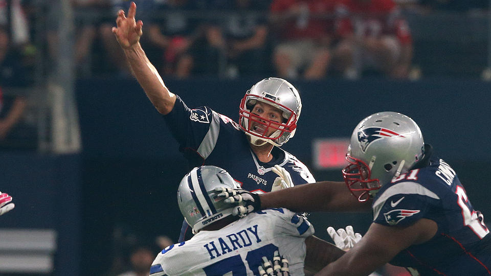 IN A RUSH Cowboys defensive end Greg Hardy puts the pressure on Tom Brady during yesterday’s game in Arlington Texas