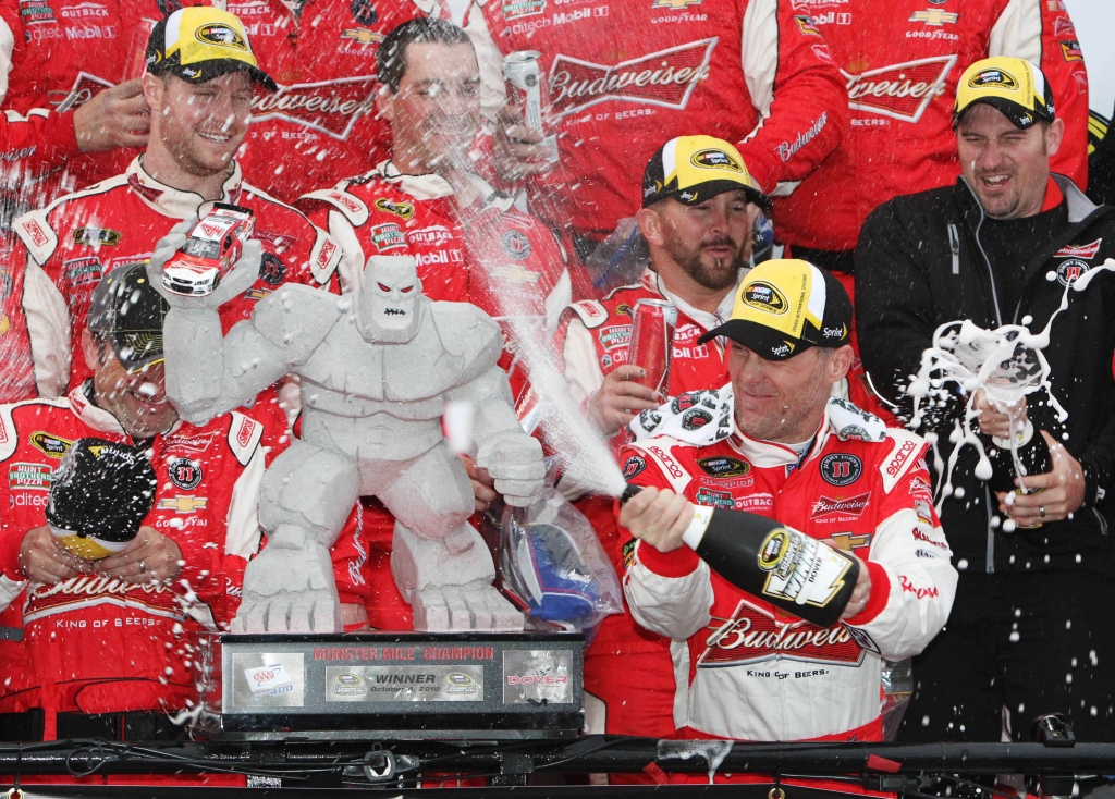 Oct 4 2015 Dover DE USA NASCAR Sprint Cup Series driver Kevin Harvick sprays champaign in victory lane after winning the AAA 400 at Dover International Speedway. Mandatory Credit Matthew O'Haren-USA TODAY Sports