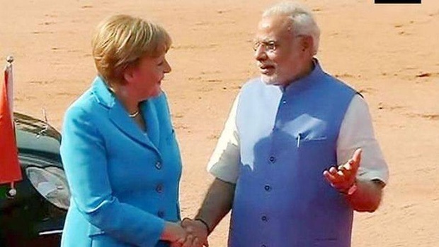 German Chancellor Angela Merkel with Prime Minister Narendra Modi. | ANI