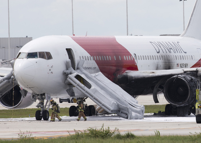 Plane catches fire at Ft. Lauderdale International Airport