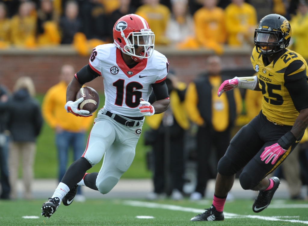 Oct 11 2014 Columbia MO USA Georgia Bulldogs wide receiver Isaiah Mc Kenzie returns a kick as Missouri Tigers defensive lineman Rickey Hatley defends during the first half at Faurot Field. Mandatory Credit Denny Medley-USA TODAY Sports