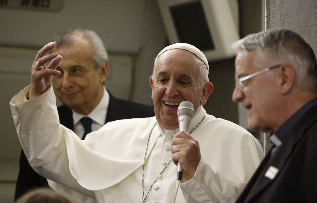 Pope Francis speaks with journalists aboard his flight from Philadelphia to Rome on 27 September 2015