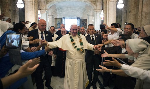 Sept. 20 2015 Pope Francis is greeted by faithful as he enters the San Cristobal Cathedral Havana Cuba. Francis presided over the evening prayer service in Havana's 18th century cathedral where he broke from prepar