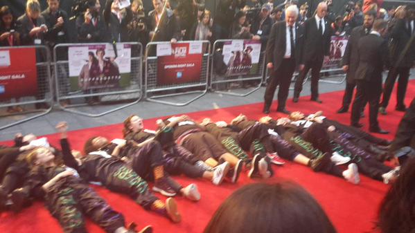 Suffragette red carpet invaded by campaigners against domestic abuse